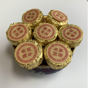 Выдержанный нефритовый Шу пуэр 2003 год 100 г. Photo 2